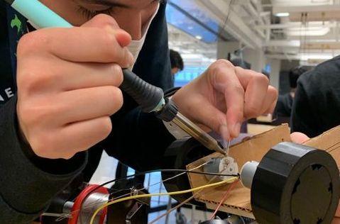 Soldering the DC motor.