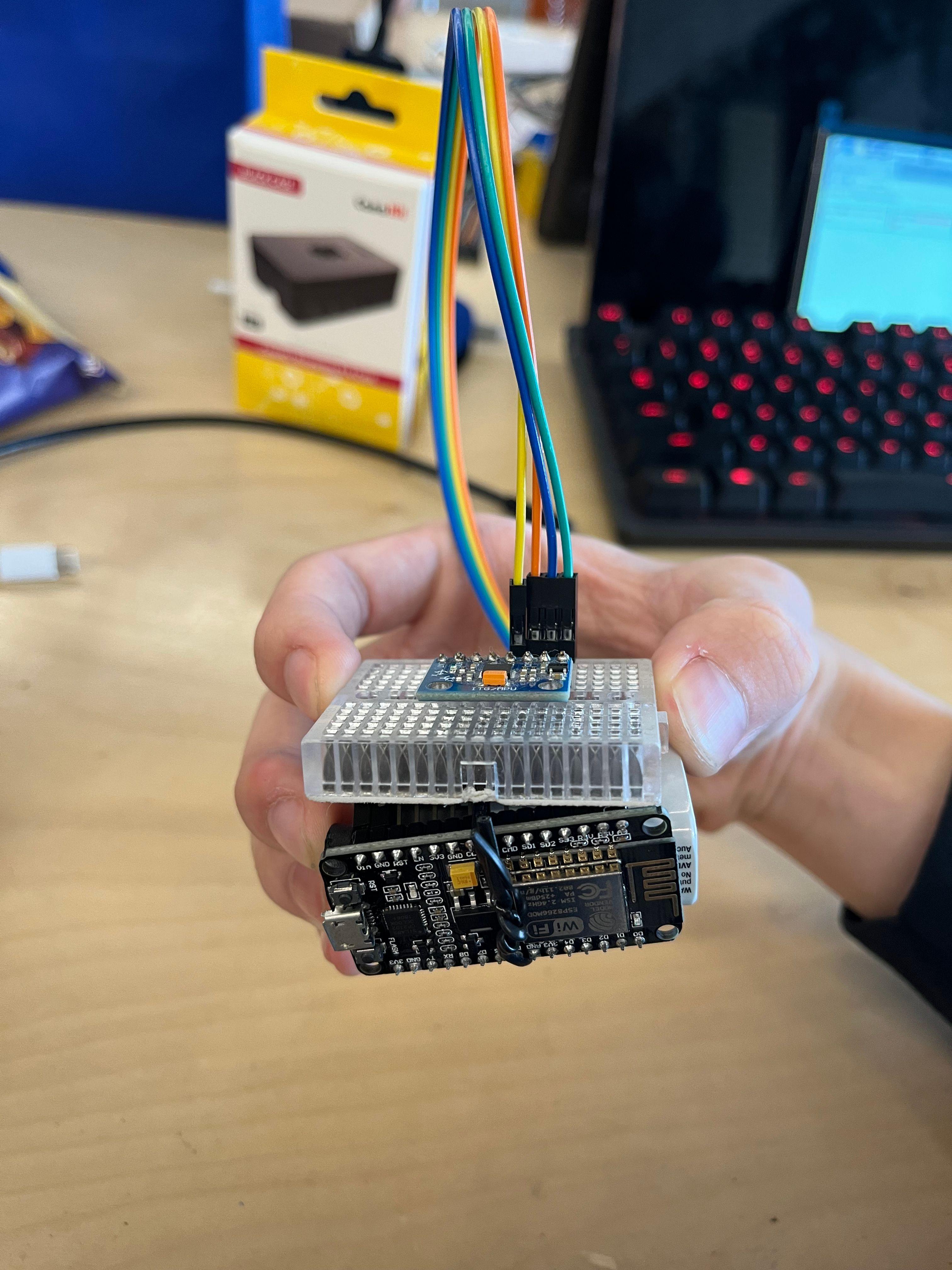 The ESP8266 with the gyro sensor to detect changes in the patient’s angular velocity.