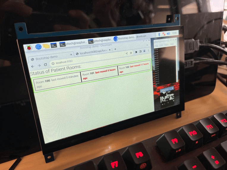 The Flask server along with live video stream after OpenCV processing on the touchscreen display.